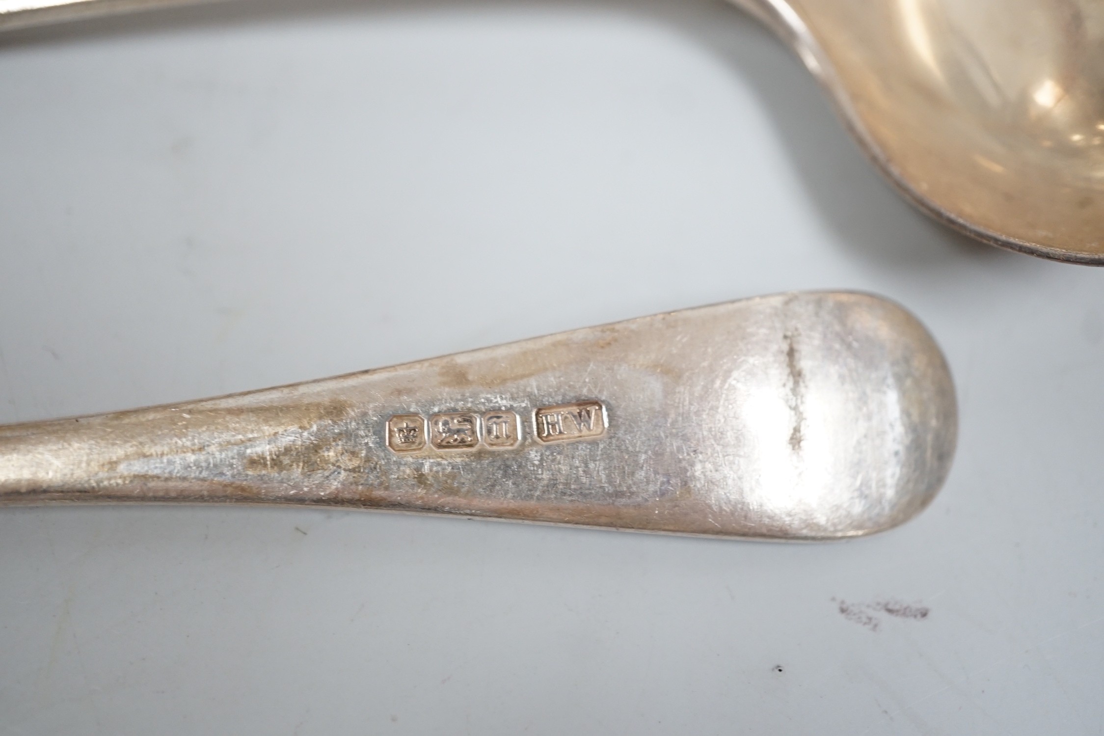 Mixed silver and plated ware including a Victorian silver Kings pattern soup ladle, London, 1857, a George III silver marrow scoop, London, 1789, a pair of later Old English pattern sauce ladles, a sterling bonbon dish,